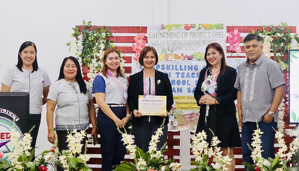 Ms. Anna Gale Vallez, Program Specialist, joined by Mr. Luis Germina, PSDS-Calauan; Ms. Soledad Villanueva, PSDS-Los Baños; Ms. Lorevie Rivera, Principal II of Bubukal Elementary Schools, and principals and school heads from DepEd-Calauan during the presentation of certificates.