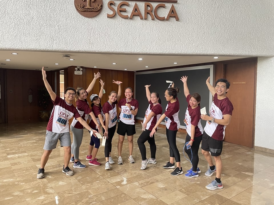 Ms. Donna Bae N. Malayang (center), Program Associate, Research and Thought Leadership Department, emerged victorious as the only SEARCA delegate who won a medal during the fun run.