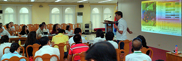 Mr. Elmer Mercado, Project Team Leader presenting summary of baseline information on Upper Marikina River Basin Protected Landscape (UMRBPL) and sectoral vulnerability assessments on health, agriculture, forest, water and roads and bridges.