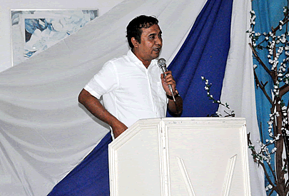 Engr. Emmanuel G. Aguinaldo, Provincial Agrarian Reform Program Officer II, delivers his welcome remarks during the Graduation Ceremony of Farmer Technicians under the ARCCESS project on 29 September 2014 at Valenzuela Pavillon, Doña Enriqueta Subdivision, Baliuag, Bulacan.