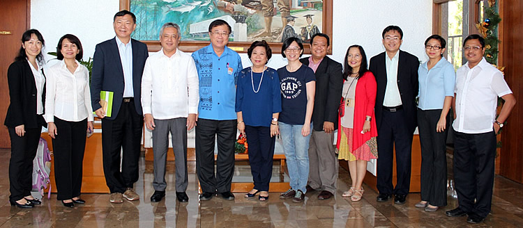 Dr. Bao-ji Chen (fifth from left), Minister of COA, Taiwan, visited SEARCA on 3 December 2015. With him were COA Deputy Minister James Chih-i Sha (third from left); Ms. Ming-chuan Chung (leftmost), Specialist, COA Department of International Affairs; Mr. Eric Chen (third from right), First Secretary, Taiwan Embassy in the Philippines; Dr. Chih-wei Tung (sixth from right), Assistant Professor, NTU Department of Agronomy; and Mr. Ronald G. Mangubat (fifth from right), FFTC Information Officer. They were received by Dr. Gil C. Saguiguit, Jr. (fourth from left), SEARCA Director; Dr. Virginia R. Cardenas (sixth from left), Deputy Director for Administration; Dr. Maria Celeste H. Cadiz (fourth from right), Program Head for Knowledge Management; Dr. Lope B. Santos III (rightmost), Program Specialist and Officer in Charge, Project Development and Technical Services; Ms. Carmen Nyhria G. Rogel (second from left), Program Specialist for Research and Development; and Ms. Zacyl R. Jalotjot (second from right), Program Specialist for Graduate Education and Institutional Development. 