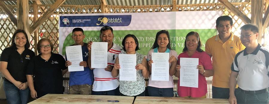 L-R: Ms. Nancy Landicho, SEARCA Program Specialist; Engr. Fiorelia Aguinaldo, CBED Coordinator, PCC at CLSU; Mr. Roberto Francisco, Vice Chairman, Malibay Agressive Cooperative; Mr. Ernesto Santos, Chairman, Malibay Aggressive Cooperative; Ms. Soledad Tecson, Chairman, Lambakin Aggressive MPC; Ms. Susan Benette Mendoza, Chairman, Labne; Ms. Alicia Aquino, Vice Chairman, Labne Producers coop; Mr. Herbert Maniquiz, Brgy. Captain, Malibay; and Dr. Daniel Aquino, Center Director, PCC at CLSU.